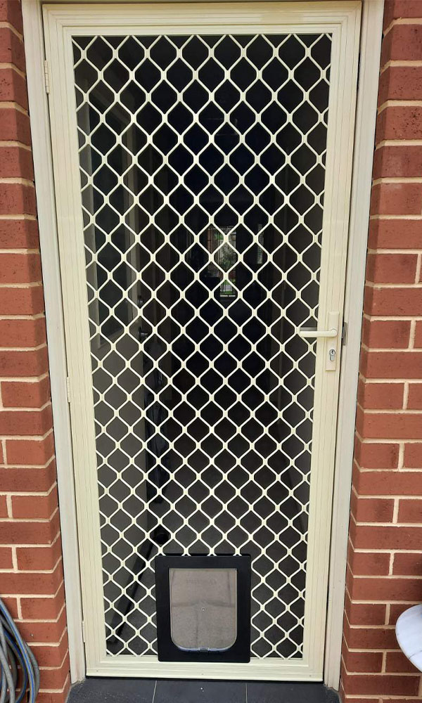 Diamond grill security screen door with dog doors/ pet door