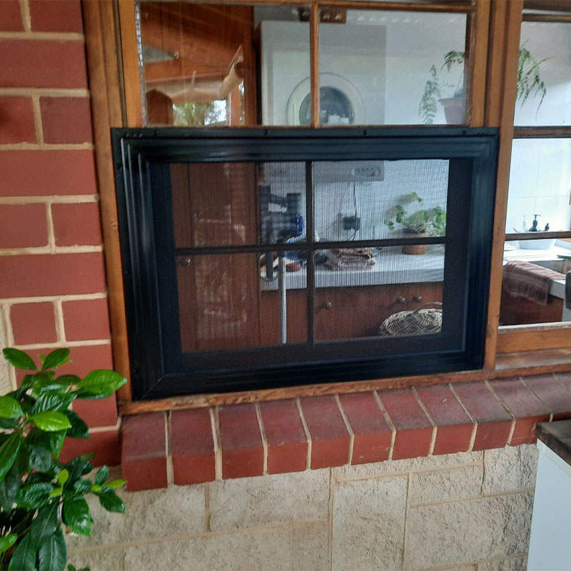 Black Fire Scape security window screens in kitchen area